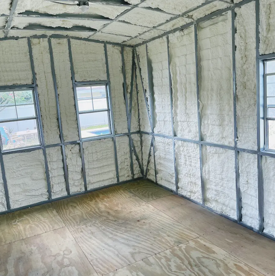 Closed-cell spray foam insulation applied to wall cavities in a residential project in Dacono